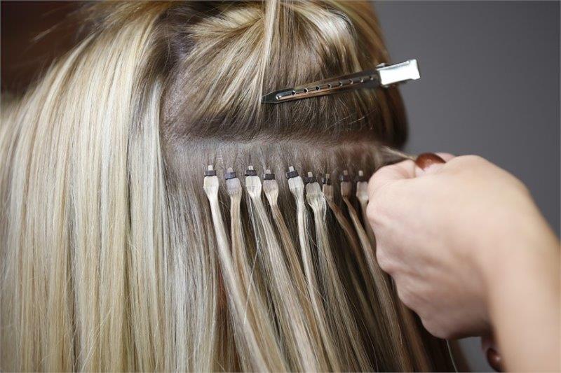 Professional U Tip hair extension heat fusion installation Professional U Tip hair extension heat fusion installation by trained stylist
