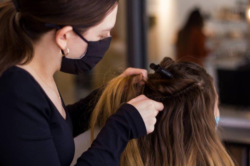 Where do suppliers of human hair extensions in the UK get their hair from?