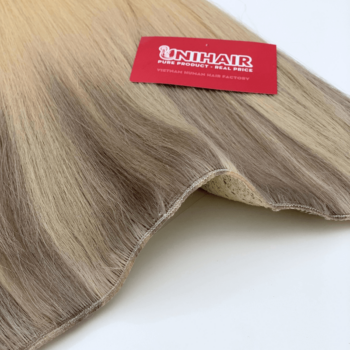 Alternative view of Halo Hair Extensions with Golden Blonde Mixed Color Straight Hair
