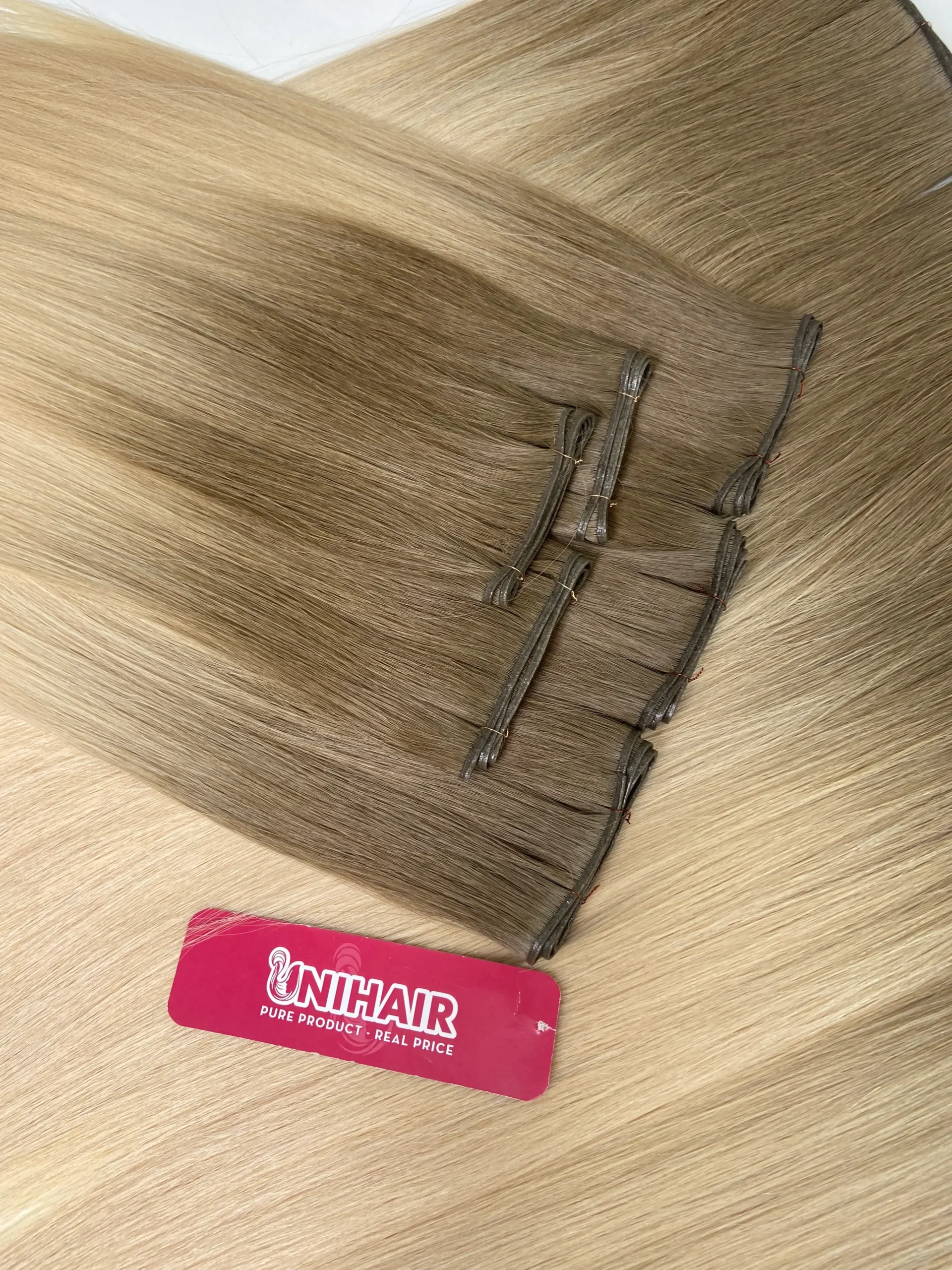 Genius Weft Vietnamese human hair bundle showing flexible weft base Genius Weft Vietnamese human hair bundle showing flexible weft base