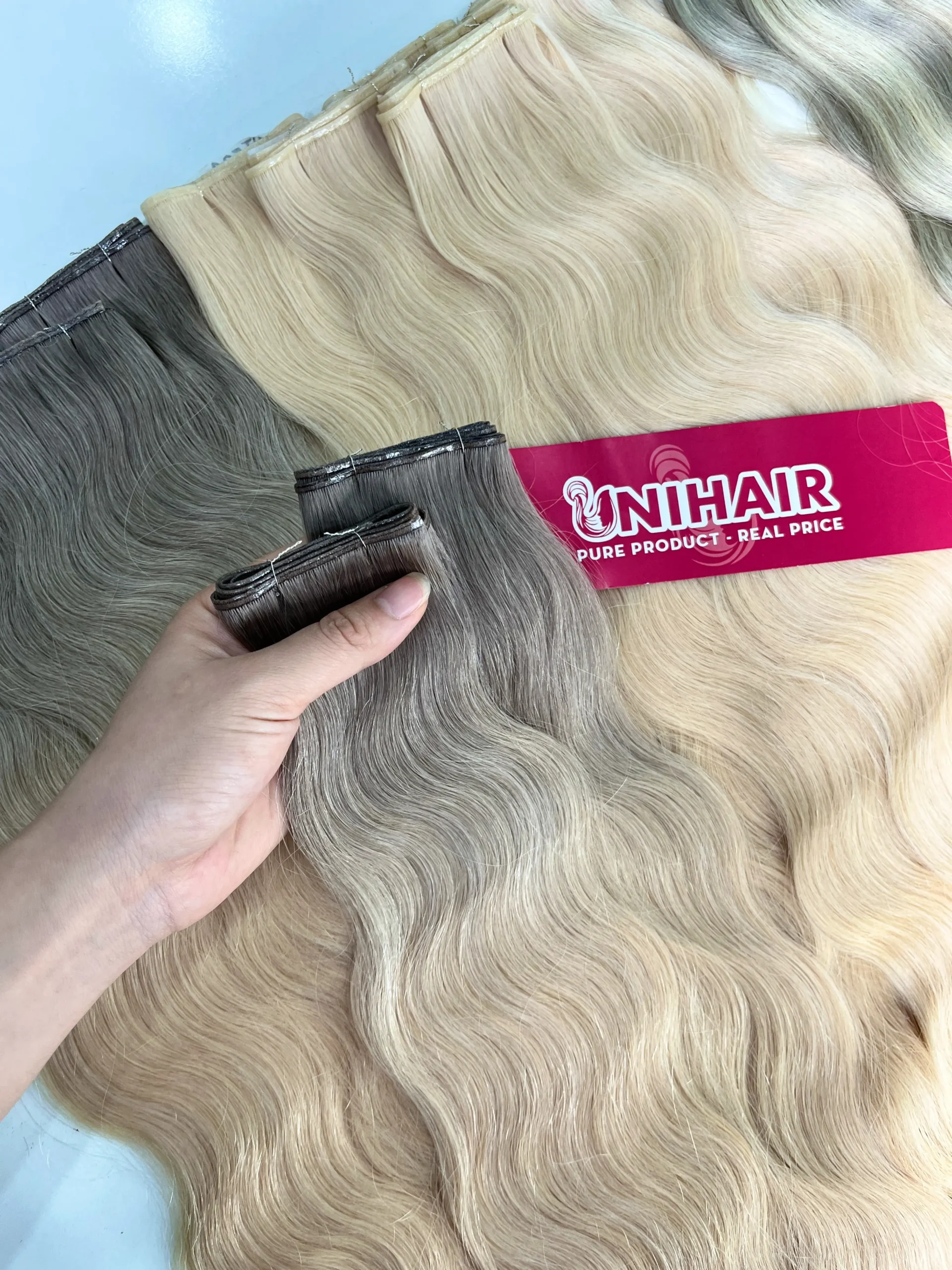 Genius Weft Hair Extensions image 17 showing quality and buyer benefits by Unihairvn Vietnam hair factory Genius Weft Hair Extensions image 17 showing quality and buyer benefits by Unihairvn Vietnam hair factory