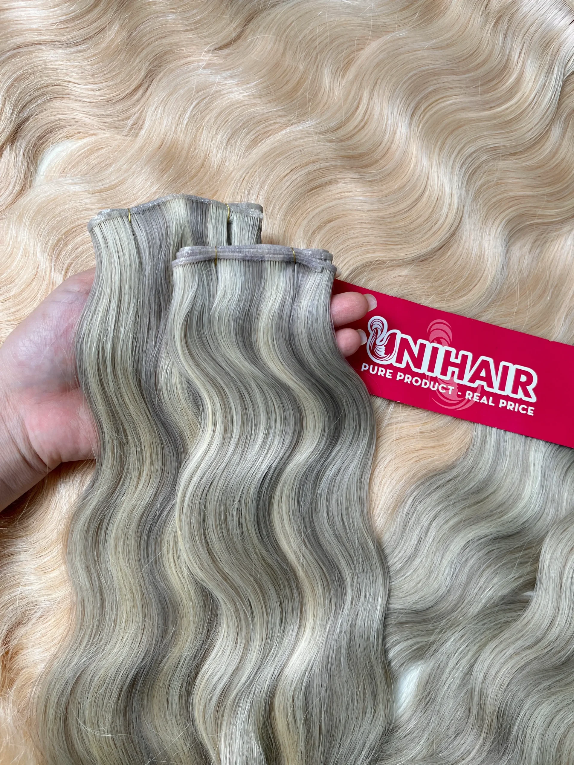 Genius Weft Hair Extensions image 14 showing product gallery close-up by Unihairvn Vietnam hair factory Genius Weft Hair Extensions image 14 showing product gallery close-up by Unihairvn Vietnam hair factory