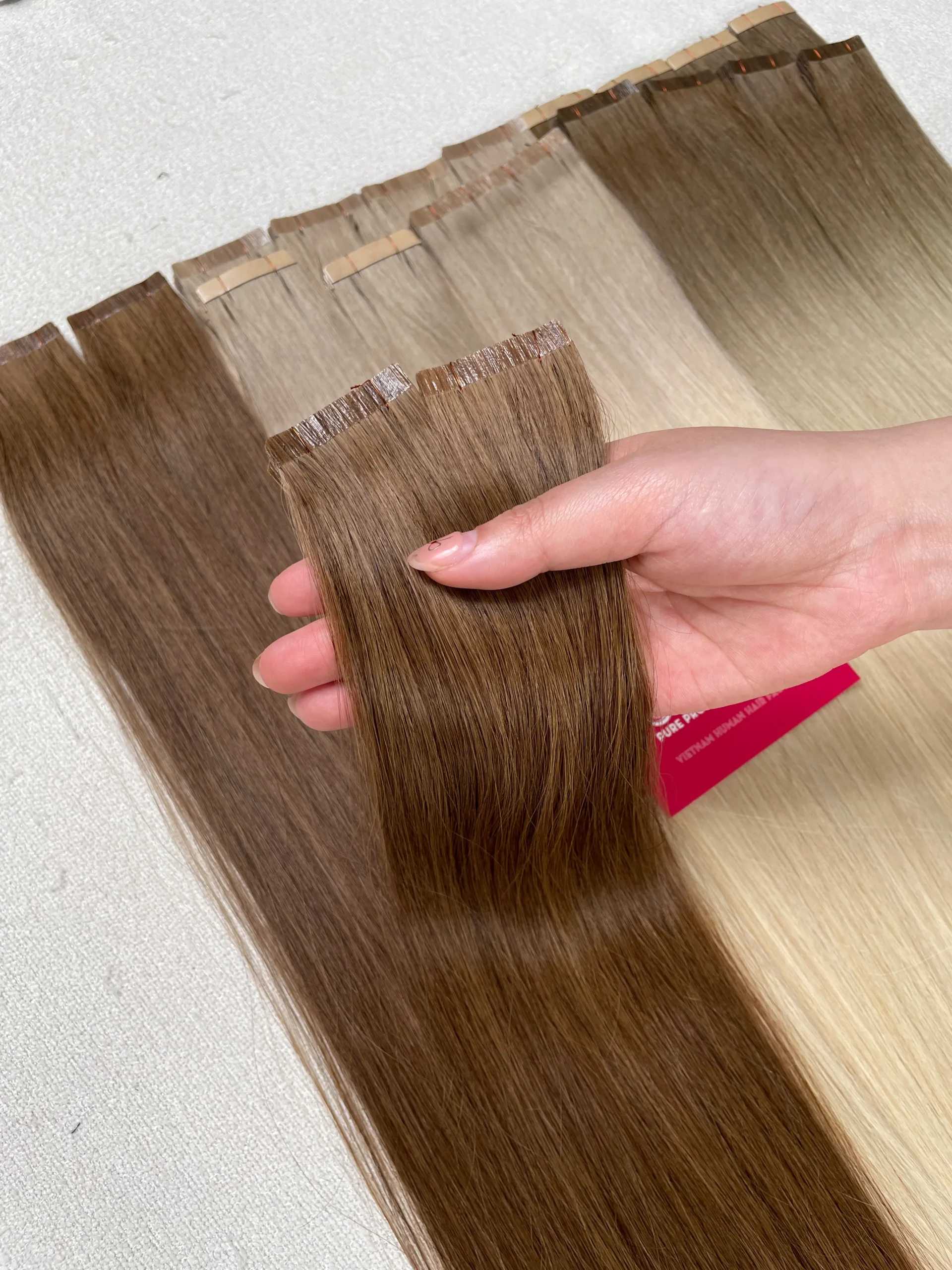 Normal Tape-In Hair Extensions image 1 showing hero product visual by Unihairvn Vietnam hair factory